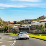 Cars on curved residential road